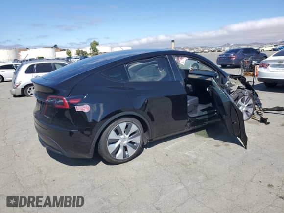 2023 Tesla Model Y Long Range с VIN 7SAYGAEE3PF903721, выставлен на аукционе Copart как лот 68774815 с пробегом Не указан миль и Списание • Salvage title. История ставок и продаж доступна на DreamBid. Изображение 3.