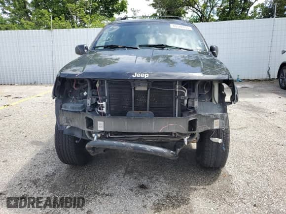2004 Jeep Grand Cherokee Overland с VIN 1J8GW68J34C103309, выставлен на аукционе Copart как лот 65548855 с пробегом 96 096 миль миль и Списание • Salvage title. История ставок и продаж доступна на DreamBid. Изображение 5.