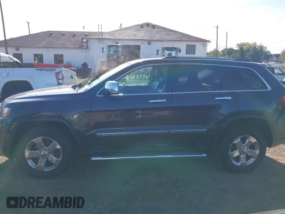 2013 Jeep Grand Cherokee Limited z VIN 1C4RJFBG4DC648995, wystawiony jako IAAI lot #43338050 z przebiegiem 138 551 mil mil oraz . Historia ofert i sprzedaży dostępna na DreamBid. Obrazek 14.