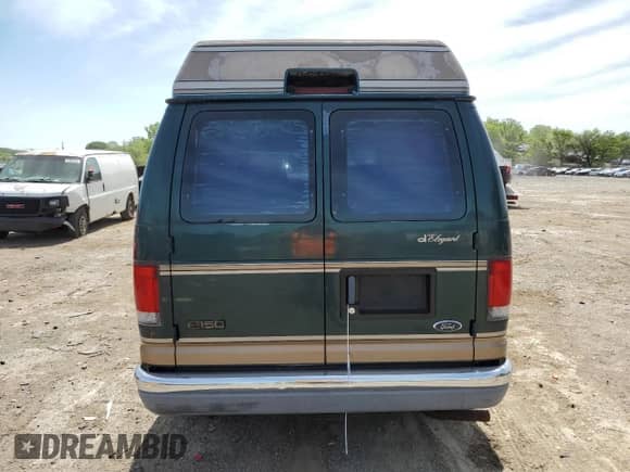 2000 Ford Econoline Cargo Recreational с VIN 1FDRE14W6YHA11042, выставлен на аукционе Copart как лот 57590055 с пробегом 101 772 миль миль и Списание • Salvage title. История ставок и продаж доступна на DreamBid. Изображение 6.