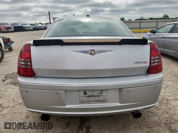 2007 Chrysler 300 C SRT-8 with VIN 2C3LA73W17H617839, listed as a Copart auction lot 60858475 with 180,655 mi miles and Salvage title. Bid and sale history available at DreamBid. Image 6.