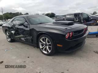 2014 Dodge Challenger R/T with VIN 2C3CDYBT6EH179739, listed as a Copart auction lot 81823515 with 107,098 mi miles and Salvage title. Bid and sale history available at DreamBid. Image 4.