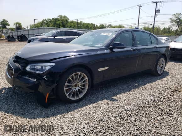 2015 BMW 7 Series 750Li xDrive with VIN WBAYF8C54FG245534, listed as a Copart auction lot 59421255 with 135,026 mi miles and Salvage title. Bid and sale history available at DreamBid. Image 1.