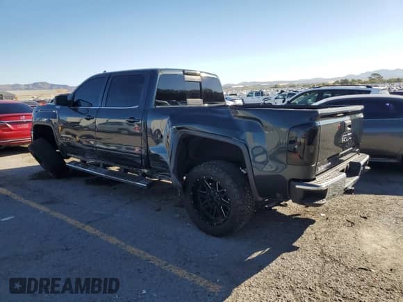 2017 GMC Sierra 1500 SLE with VIN 3GTU2MEC4HG473218, listed as a Copart auction lot 82079865 with 111,647 mi miles and Salvage title. Bid and sale history available at DreamBid. Image 2.