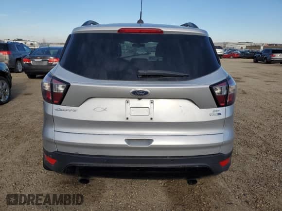 2017 Ford Escape SE с VIN 1FMCU9GD9HUA16681, выставлен на аукционе Copart как лот 87470305 с пробегом 259 399 миль миль и Чистый • Clean title. История ставок и продаж доступна на DreamBid. Изображение 6.