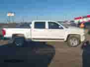 2016 Chevrolet Silverado 1500 LT z VIN 3GCUKREC5GG276375, wystawiony jako IAAI lot #43577857 z przebiegiem 125 238 mil mil oraz . Historia ofert i sprzedaży dostępna na DreamBid. Obrazek 13.