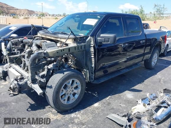 2023 Ford F-150 XLT с VIN 1FTFW1E89PKE05060, выставлен на аукционе IAAI как лот 43299204 с пробегом 79 389 миль миль и . История ставок и продаж доступна на DreamBid. Изображение 2.