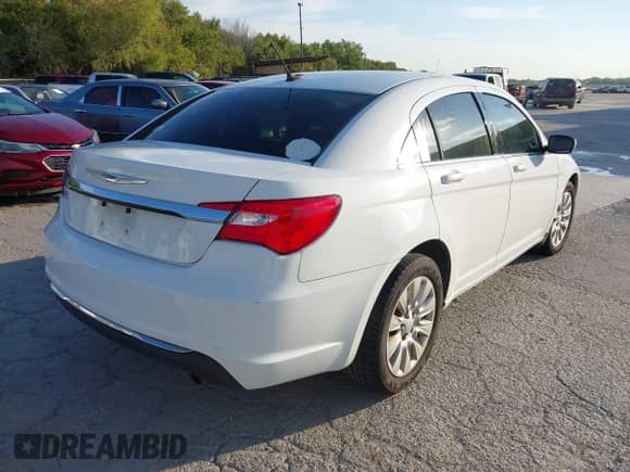 2014 Chrysler 200 LX with VIN 1C3CCBAB0EN140841, listed as a IAAI auction lot 43394740 with 160,614 mi miles and . Bid and sale history available at DreamBid. Image 4.