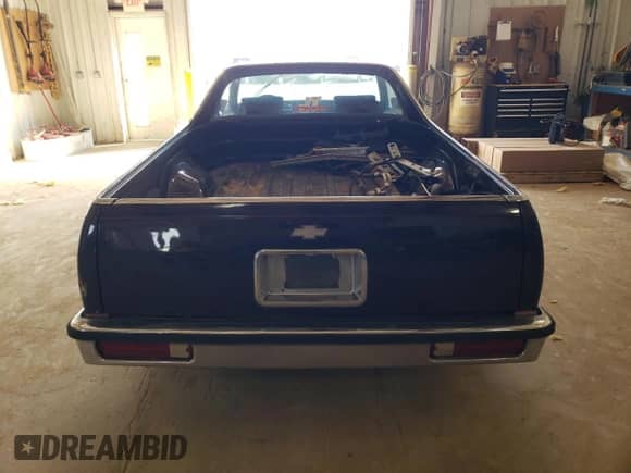 1986 Chevrolet El Camino SS с VIN 3GCCW80H8GS910613, выставлен на аукционе Copart как лот 49894925 с пробегом 65 386 миль миль и Списание • Salvage title. История ставок и продаж доступна на DreamBid. Изображение 6.
