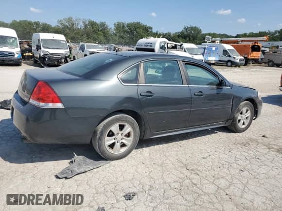 2013 Chevrolet Impala LS с VIN 2G1WF5E32D1173322, выставлен на аукционе Copart как лот 69231815 с пробегом 184 110 миль миль и Списание • Salvage title. История ставок и продаж доступна на DreamBid. Изображение 3.