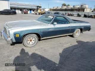 1977 Chevrolet El Camino z VIN 1D80L7R420505, wystawiony jako Copart lot #82137504 z przebiegiem 48 606 mil mil oraz Czysty tytuł • Clean title. Historia ofert i sprzedaży dostępna na DreamBid. Obrazek 1.