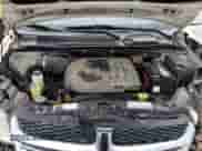 2013 Dodge Grand Caravan SXT with VIN 2C4RDGCG6DR575826, listed as a Copart auction lot 57378454 with 169,953 mi miles and Salvage title. Bid and sale history available at DreamBid. Image 11.