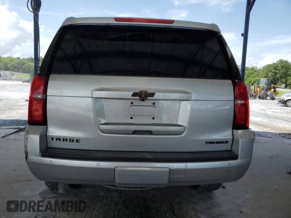 2019 Chevrolet Tahoe Premier with VIN 1GNSCCKJ4KR266232, listed as a Copart auction lot 63289845 with 89,157 mi miles and Salvage title. Bid and sale history available at DreamBid. Image 6.