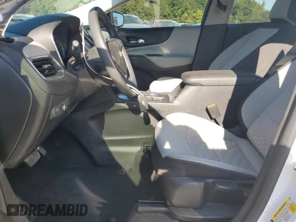 2018 Chevrolet Equinox LS with VIN 3GNAXHEV9JL358793, listed as a Copart auction lot 72054215 with 94,108 mi miles and Salvage title. Bid and sale history available at DreamBid. Image 7.