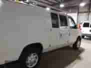 2014 Ford Econoline Cargo Commercial with VIN 1FTNE2EL6EDB13764, listed as a IAAI auction lot 42647684 with 99,876 mi miles and . Bid and sale history available at DreamBid. Image 13.
