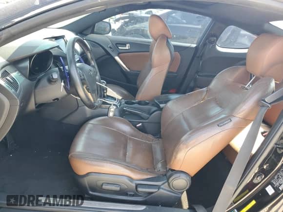 2013 Hyundai Genesis Coupe Track z VIN KMHHU6KJ6DU094394, wystawiony jako Copart lot #53101945 z przebiegiem 117 219 mil mil oraz Szkoda całkowita • Salvage title. Historia ofert i sprzedaży dostępna na DreamBid. Obrazek 7.