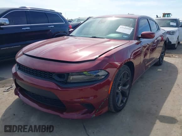 2019 Dodge Charger SXT with VIN 2C3CDXBGXKH547283, listed as a IAAI auction lot 43149551 with 122,906 mi miles and . Bid and sale history available at DreamBid. Image 2.