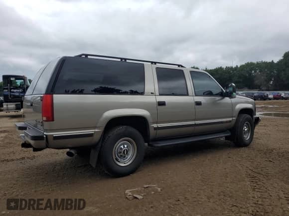 1999 Chevrolet Suburban с VIN 1GNGK26J0XJ439859, выставлен на аукционе Copart как лот 69076004 с пробегом 277 201 миль миль и Списание • Salvage title. История ставок и продаж доступна на DreamBid. Изображение 3.