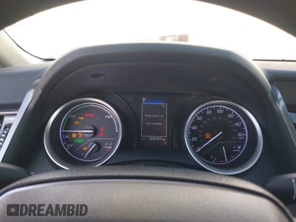 2021 Toyota Camry Hybrid LE with VIN 4T1C31AK7MU554477, listed as a IAAI auction lot 43395450 with 139,747 mi miles and . Bid and sale history available at DreamBid. Image 7.