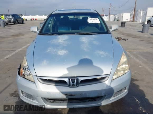 2006 Honda Accord with NAVI z VIN JHMCN36506C000038, wystawiony jako IAAI lot #43012636 z przebiegiem 164 211 mil mil oraz . Historia ofert i sprzedaży dostępna na DreamBid. Obrazek 13.