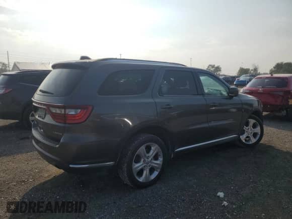 2014 Dodge Durango Limited with VIN 1C4RDJDG4EC306990, listed as a Copart auction lot 71255045 with Not provided miles and Salvage title. Bid and sale history available at DreamBid. Image 3.