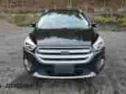 2017 Ford Escape Titanium with VIN 1FMCU0J90HUB64587, listed as a Copart auction lot 86682055 with 64,514 mi miles and Salvage title. Bid and sale history available at DreamBid. Image 5.