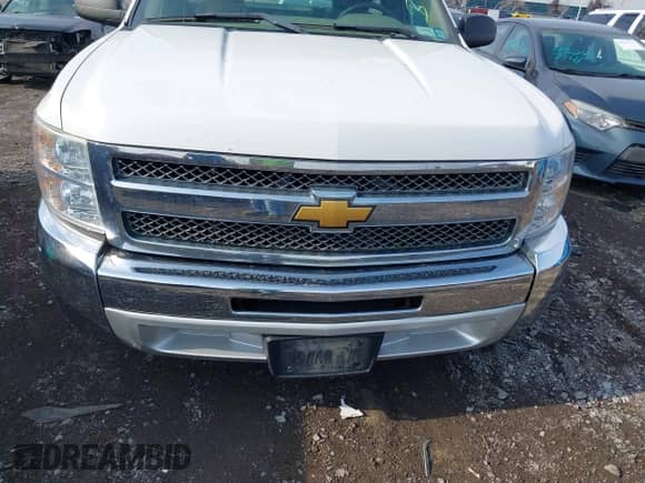 2013 Chevrolet Silverado 1500 Work Truck z VIN 1GCNCPEX3DZ394414, wystawiony jako IAAI lot #43277557 z przebiegiem 155 084 mil mil oraz . Historia ofert i sprzedaży dostępna na DreamBid. Obrazek 6.
