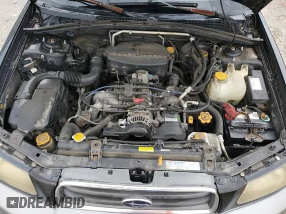 2004 Subaru Forester X with VIN JF1SG65684G742542, listed as a Copart auction lot 73580424 with 272,274 mi miles and Salvage title. Bid and sale history available at DreamBid. Image 11.