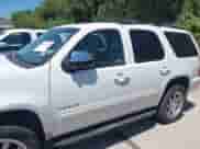 2014 Chevrolet Tahoe LT with VIN 1GNSCBE03ER213054, listed as a IAAI auction lot 42821489 with 166,689 mi miles and . Bid and sale history available at DreamBid. Image 14.