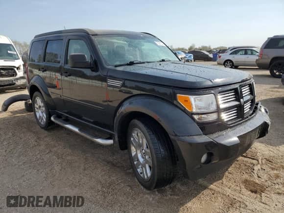2007 Dodge Nitro R/T с VIN 1D8GU586X7W722030, выставлен на аукционе Copart как лот 75231294 с пробегом 117 469 миль миль и Списание • Salvage title. История ставок и продаж доступна на DreamBid. Изображение 4.