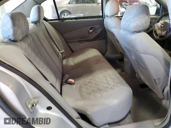 2004 Chevrolet Malibu LS z VIN 1G1ZT52844F113573, wystawiony jako Copart lot #70886814 z przebiegiem Nie podano mil oraz Szkoda całkowita • Salvage title. Historia ofert i sprzedaży dostępna na DreamBid. Obrazek 10.