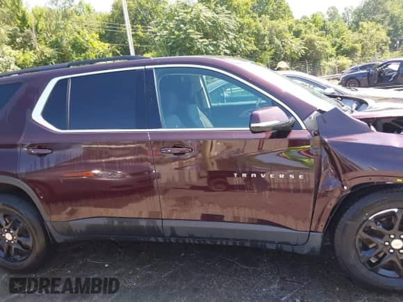 2019 Chevrolet Traverse LT Cloth with VIN 1GNERGKW1KJ192748, listed as a IAAI auction lot 42794301 with 121,333 mi miles and . Bid and sale history available at DreamBid. Image 13.