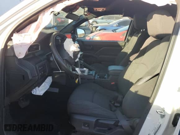 2024 Toyota Tacoma SR with VIN 3TYKD5HN9RT002032, listed as a Copart auction lot 88295185 with 6,144 mi miles and Salvage title. Bid and sale history available at DreamBid. Image 7.