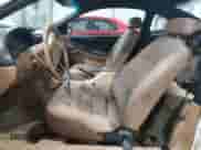 1996 Ford Mustang with VIN 1FALP4045TF168100, listed as a Copart auction lot 60464845 with 116,702 mi miles and Salvage title. Bid and sale history available at DreamBid. Image 7.