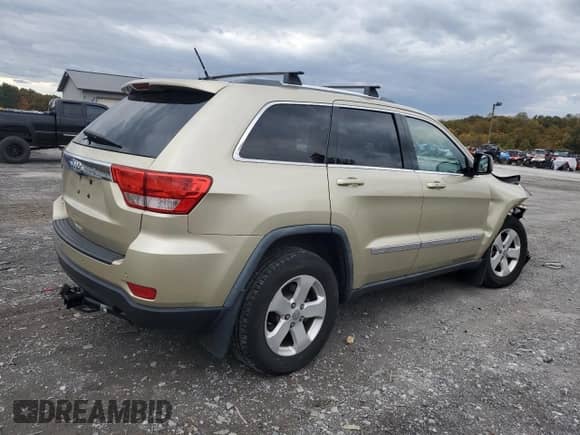 2012 Jeep Grand Cherokee Laredo z VIN 1C4RJFAG0CC156397, wystawiony jako Copart lot #87400775 z przebiegiem 165 192 mil mil oraz Szkoda całkowita • Salvage title. Historia ofert i sprzedaży dostępna na DreamBid. Obrazek 3.