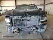 2018 Chevrolet Silverado 1500 LT z VIN 3GCUKREC9JG213996, wystawiony jako Copart lot #70379115 z przebiegiem 104 786 mil mil oraz Szkoda całkowita • Salvage title. Historia ofert i sprzedaży dostępna na DreamBid. Obrazek 5.