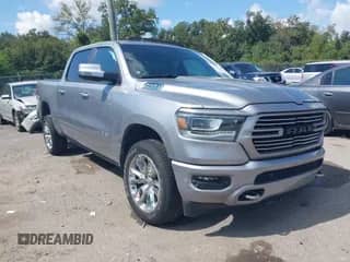 2023 Ram 1500 Laramie z VIN 1C6RREJT1PN620038, wystawiony jako IAAI lot #43394924 z przebiegiem 31 937 mil mil oraz . Historia ofert i sprzedaży dostępna na DreamBid. Obrazek 1.