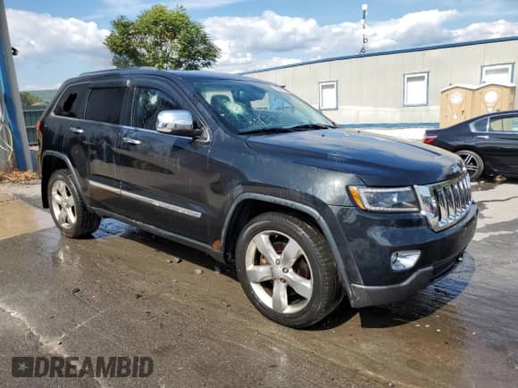 2013 Jeep Grand Cherokee Limited с VIN 1C4RJFBT4DC563944, выставлен на аукционе Copart как лот 80094825 с пробегом 204 786 миль миль и Списание • Salvage title. История ставок и продаж доступна на DreamBid. Изображение 4.