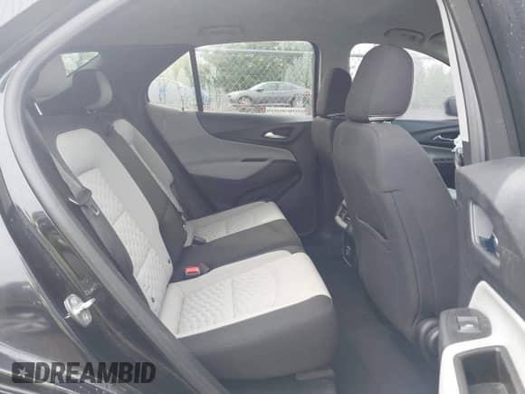 2021 Chevrolet Equinox LS z VIN 2GNAXSEV9M6142819, wystawiony jako IAAI lot #42200279 z przebiegiem 82 669 mil mil oraz . Historia ofert i sprzedaży dostępna na DreamBid. Obrazek 8.