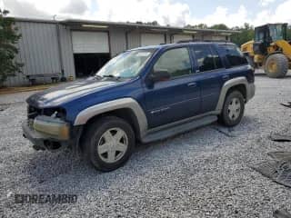 2002 Chevrolet TrailBlazer LTZ с VIN 1GNDT13S422265983, выставлен на аукционе Copart как лот 65012265 с пробегом 146 958 миль миль и Списание • Salvage title. История ставок и продаж доступна на DreamBid. Изображение 1.