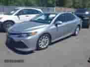 2021 Toyota Camry LE with VIN 4T1C11AK2MU538371, listed as a IAAI auction lot 42860035 with 90,662 mi miles and . Bid and sale history available at DreamBid. Image 2.