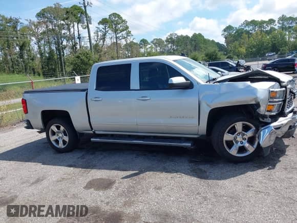 2015 Chevrolet Silverado 1500 LT z VIN 3GCPCREC2FG190191, wystawiony jako IAAI lot #43186118 z przebiegiem 96 033 mil mil oraz . Historia ofert i sprzedaży dostępna na DreamBid. Obrazek 12.