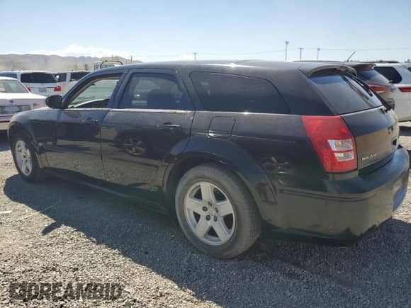 2005 Dodge Magnum SE with VIN 2D4FV48V15H617660, listed as a Copart auction lot 70591935 with 161,212 mi miles and Clean title. Bid and sale history available at DreamBid. Image 2.