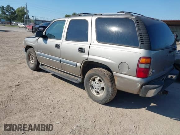 2002 Chevrolet Tahoe LS with VIN 1GNEC13Z42R257746, listed as a IAAI auction lot 43420920 with 255,761 mi miles and . Bid and sale history available at DreamBid. Image 3.