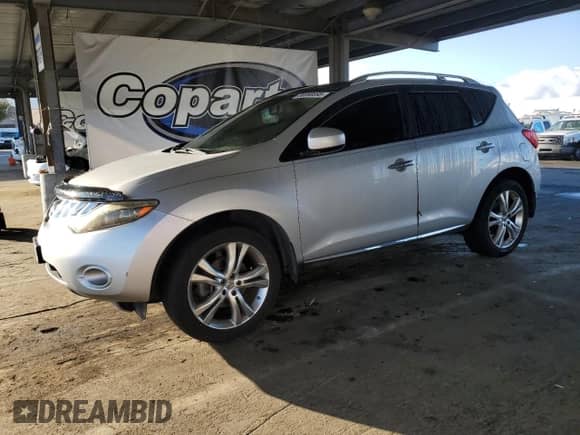 2009 Nissan Murano LE z VIN JN8AZ18W99W157081, wystawiony jako Copart lot #86690095 z przebiegiem 231 835 mil mil oraz Szkoda całkowita • Salvage title. Historia ofert i sprzedaży dostępna na DreamBid. Obrazek 1.