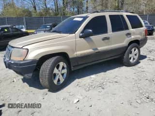 2001 Jeep Grand Cherokee Laredo с VIN 1J4GW48SX1C621136, выставлен на аукционе Copart как лот 53713195 с пробегом 252 444 миль миль и Чистый • Clean title. История ставок и продаж доступна на DreamBid. Изображение 1.