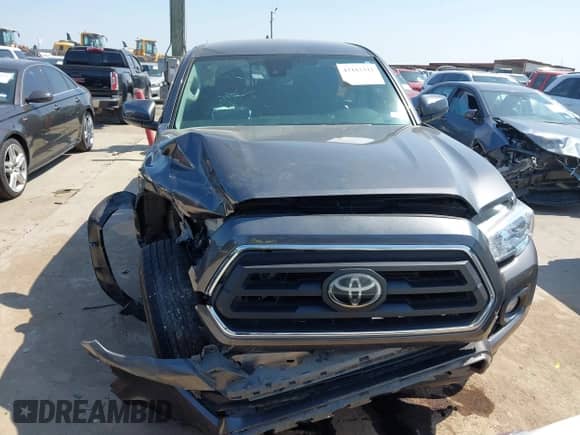 2020 Toyota Tacoma SR5 с VIN 5TFAZ5CN8LX091464, выставлен на аукционе IAAI как лот 43183342 с пробегом 59 398 миль миль и . История ставок и продаж доступна на DreamBid. Изображение 13.