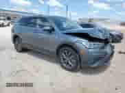 2022 Volkswagen Tiguan SE with VIN 3VV3B7AX1NM118480, listed as a Copart auction lot 71084275 with 21,950 mi miles and Salvage title. Bid and sale history available at DreamBid. Image 4.