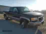 2003 GMC Sierra 1500 SLT с VIN 2GTEK19T031155644, выставлен на аукционе Copart как лот 71902745 с пробегом 142 466 миль миль и Списание • Salvage title. История ставок и продаж доступна на DreamBid. Изображение 4.