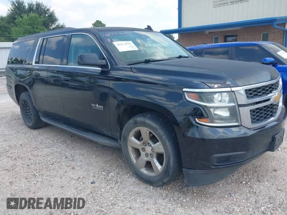 2015 Chevrolet Suburban LT with VIN 1GNSCJKC9FR642998, listed as a IAAI auction lot 42974595 with 358,414 mi miles and . Bid and sale history available at DreamBid. Image 1.